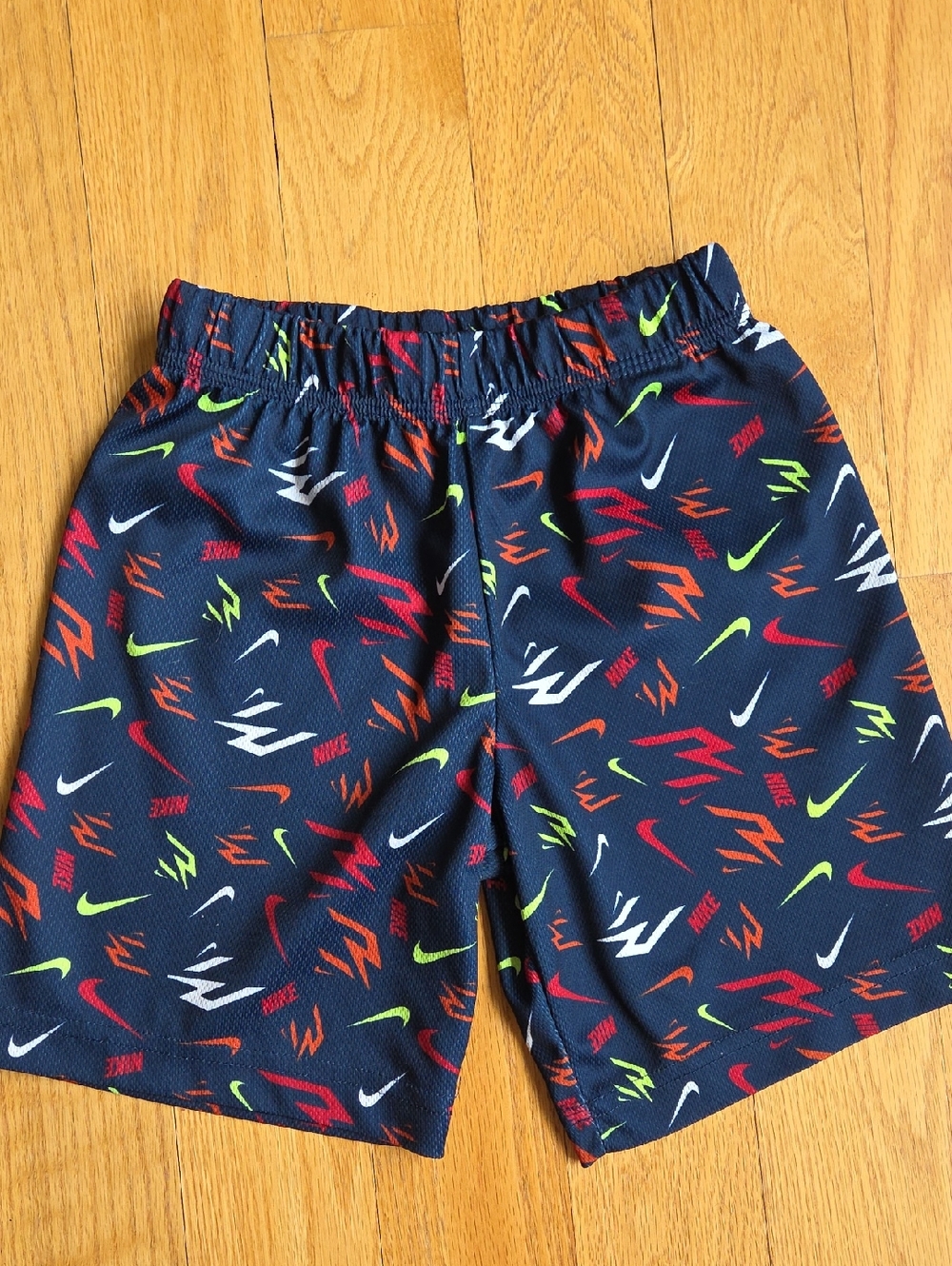 Nike Kids Navy Shorts with Multicolor Swoosh Motif SIZE 7